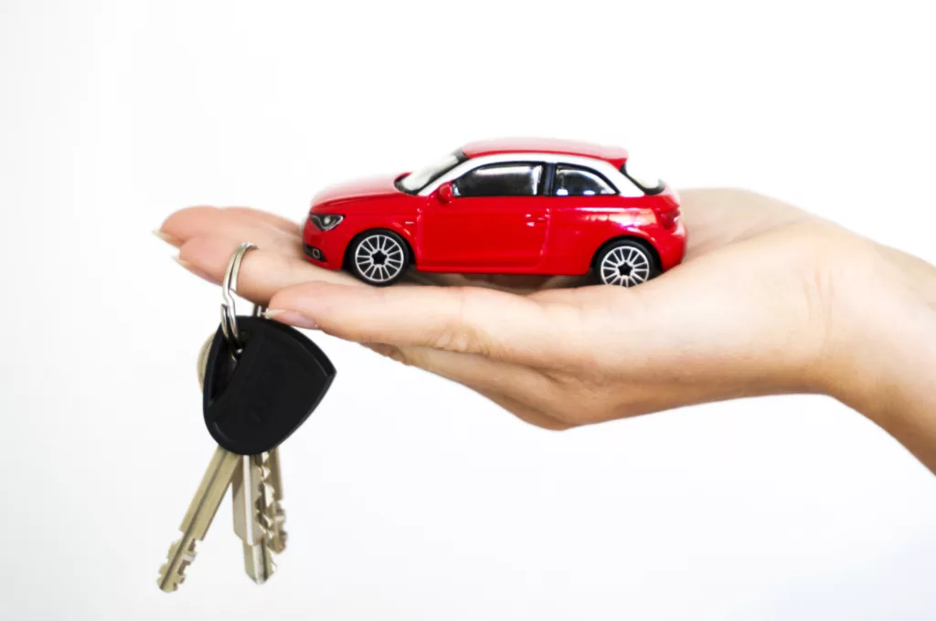 Car in hand with keys