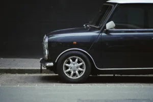 a small car parked on the side of the road