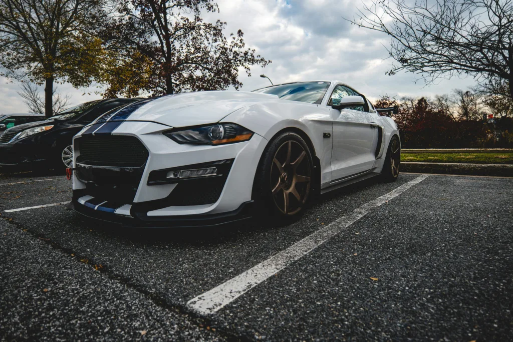 High-Performance White Sports Car in Parking Lot