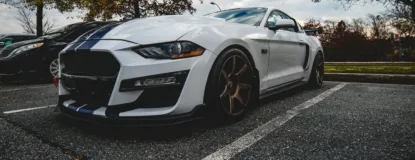 High-Performance White Sports Car in Parking Lot