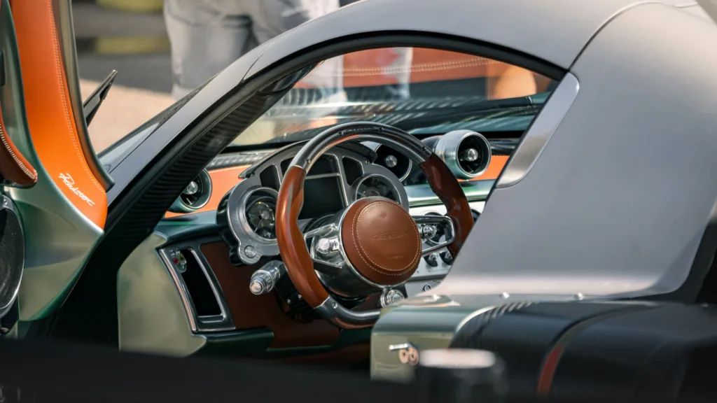 Luxury car interior with leather steering wheel