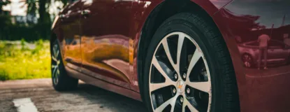 a red car with a black rim