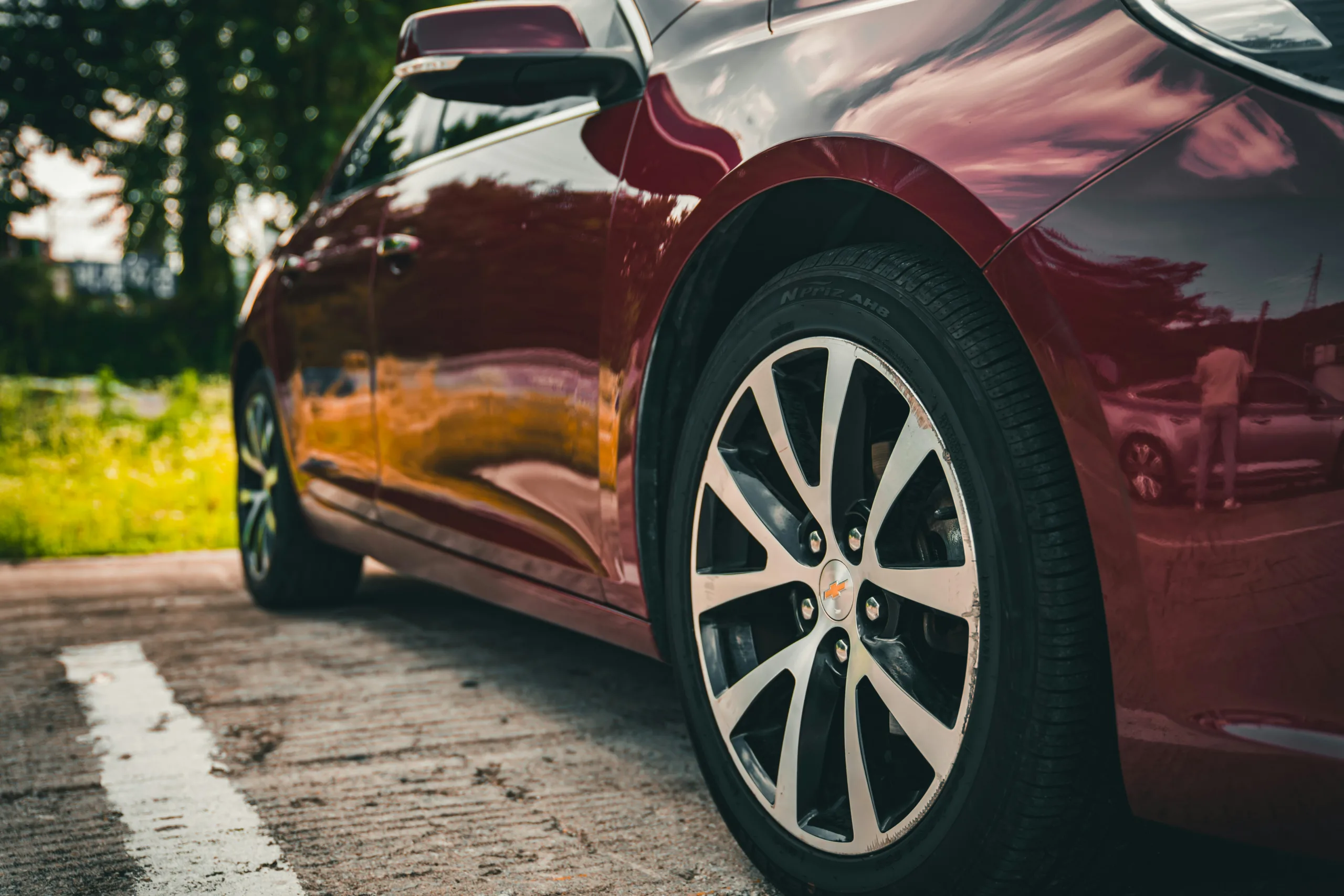 a red car with a black rim
