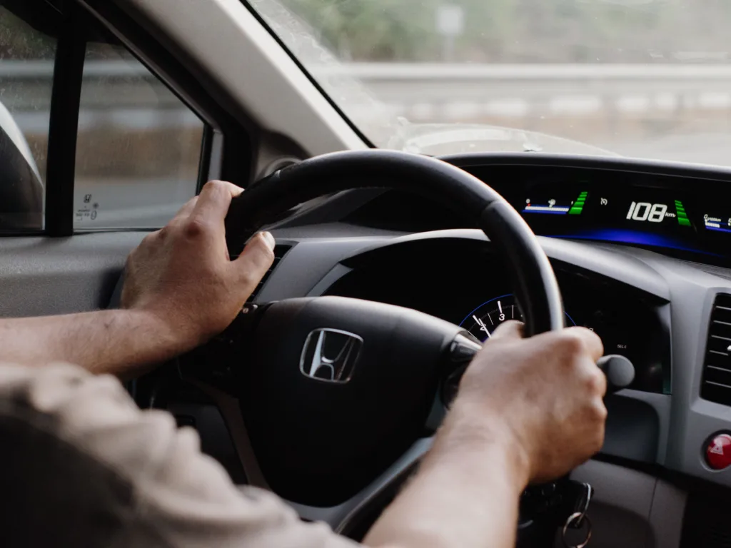 ocusing on the steering wheel and dashboard view