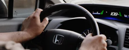 ocusing on the steering wheel and dashboard view